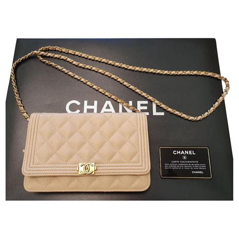 black chanel woc|Chanel beige wallet on chain.